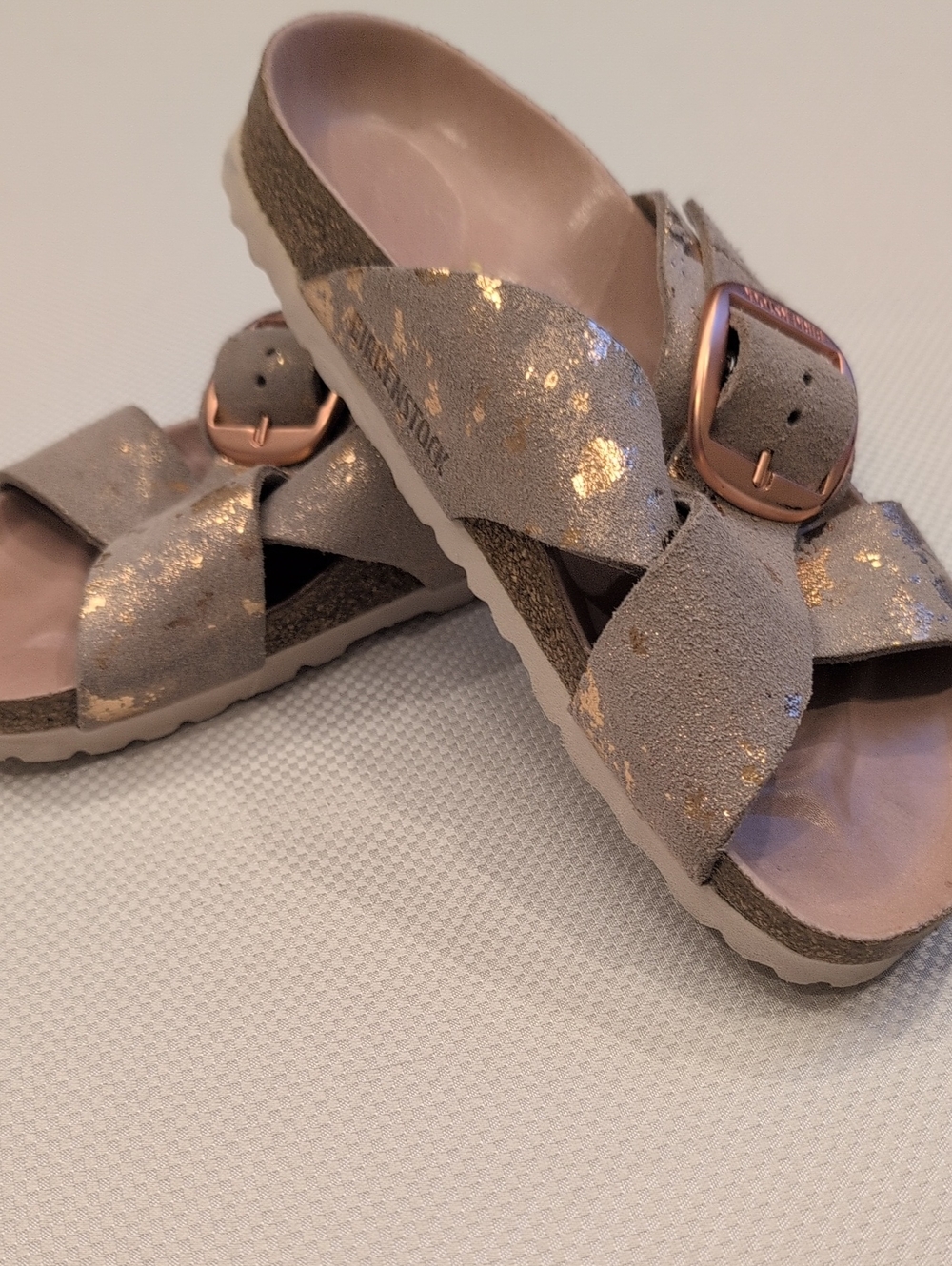 Birkenstock Women's Crisscross Leather Sandal in Pink with Rose Gold Accents